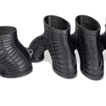 Um adaptador de coletor feito com Figure 4 RUBBER-BLK 10 
